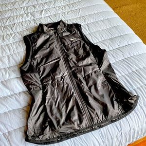 Nike Running Vest, zipped packets, brand new with tags.